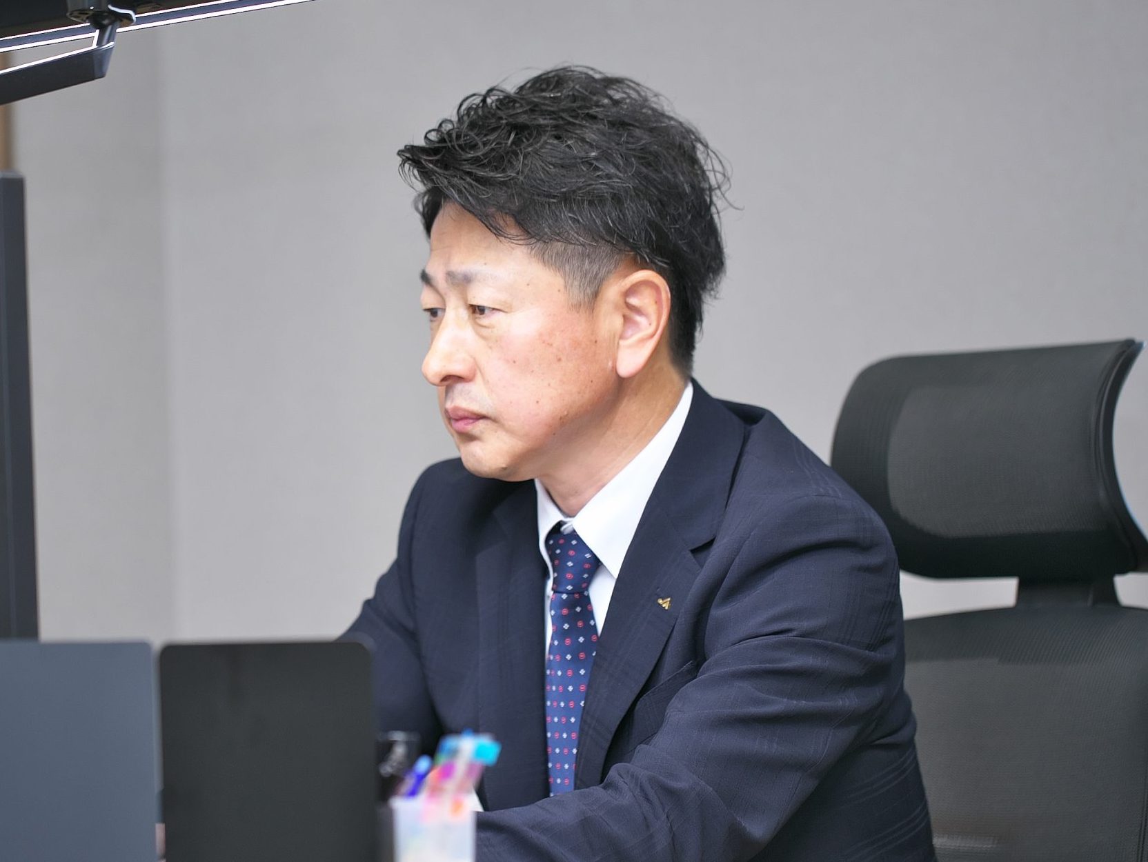 事務局長：成瀬貴之さんの顔写真